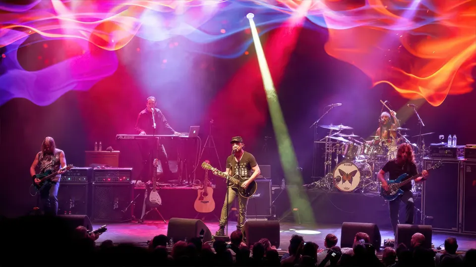 <p class="exampleTitle">“Mask Machine” <span class="inlineExampleRecorded">Live</span></p><p class="exampleArtist">Flying Colors</p>