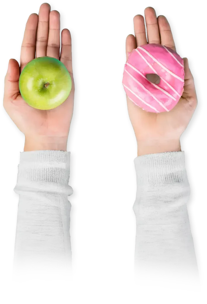 One hand hollering out a green Apple, and another hand holding out a pink, glazed donut.